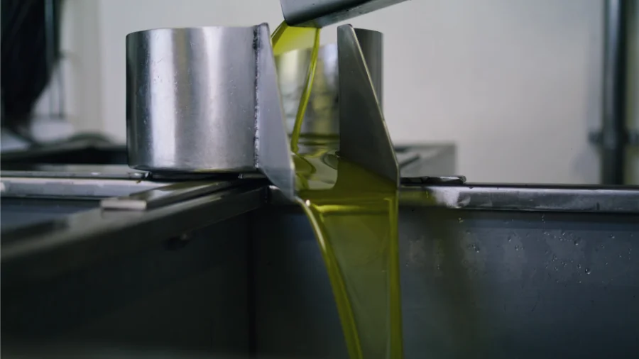 pouring grease into container kitchen